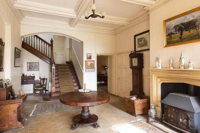 Elmestree House is a handsome Edwardian-style home that is ripe for a renovation project. Many of the rooms, including this one, retain plenty of character and charm but could also do with a sympathetic upgrade. The estate will set you back £7.5 million, however!