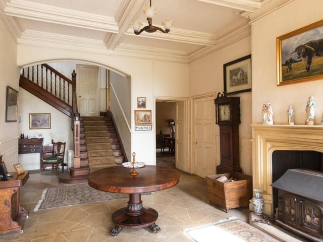 Elmestree House is a handsome Edwardian-style home that is ripe for a renovation project. Many of the rooms, including this one, retain plenty of character and charm but could also do with a sympathetic upgrade. The estate will set you back £7.5 million, however!