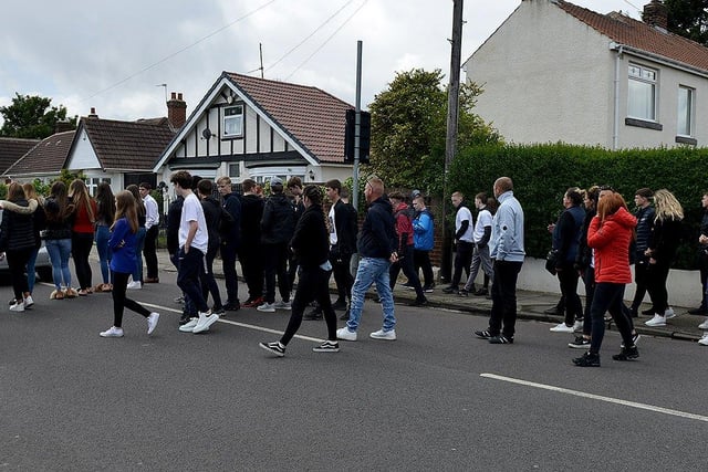 Friends followed the funeral cortege as it left the road. Picture by FRANK REID