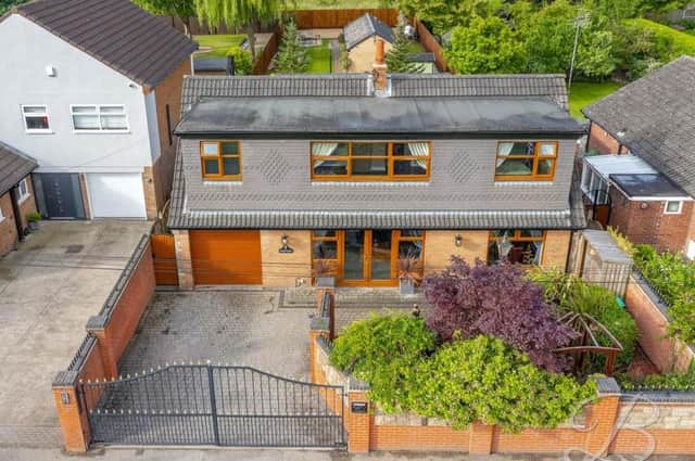 An aerial view of the detached dormer bungalow on Northfield Avenue, Pleasley Vale, which features four bedrooms, two bathrooms and two reception rooms. Electronic gates lead on to the spacious driveway.