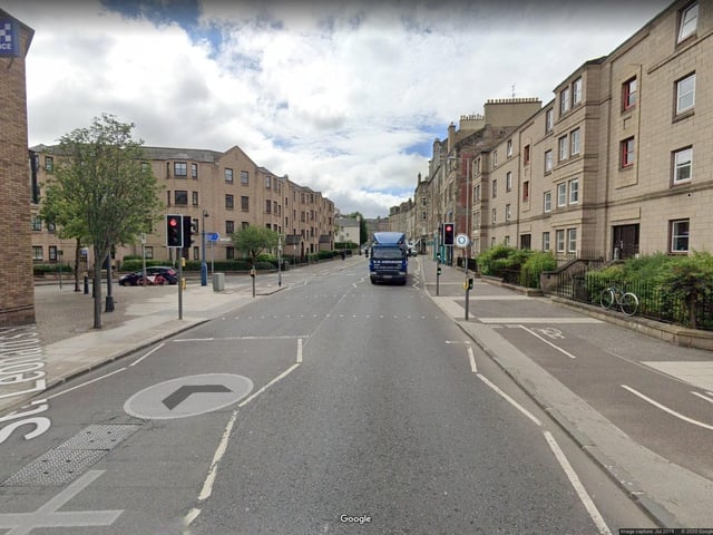 Three-way temporary traffic lights for defect reflect at Rankeillor Street