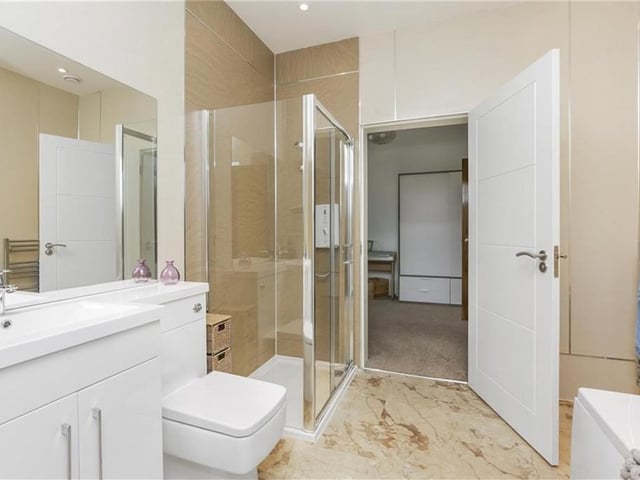 New, modern and shiny bathroom - perfect for an evening bubble bath with a red wine.