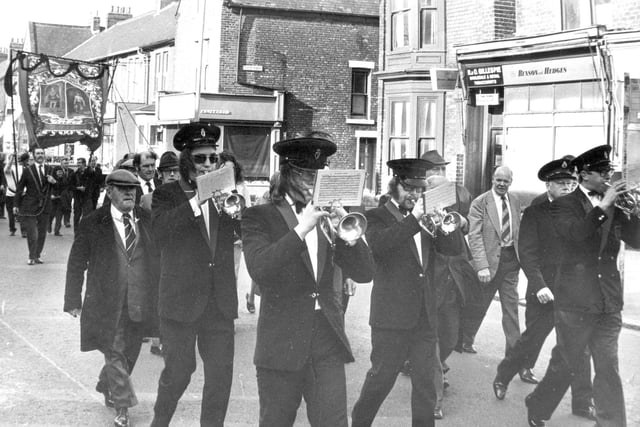 Bandsmen are pictured leading Westoe miners from their assembly point at the Armstrong Hall, South Shields, for the trip to Durham in 1974.