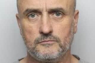 Pictured is Darren Youel, aged 54, of Rotherham Road, at Monk Bretton, Barnsley, who has been sentenced at Sheffield Crown Court to life imprisonment after he repeatedly stabbed and murdered his wife Julie Youel. During a hearing held on July 29, Darren Youel was told he must serve 12 years and six months of custody before he can be considered for release.
Sheffield Crown Court heard on July 29 how Youel called 999 for an ambulance after he had stabbed his wife Julie Youel and himself at their home.
Prosecuting barrister Mark McCone said: “The offence took place on May 21, this year, when the defendant murdered his wife Julie Youel by stabbing her many times.
“There was a 999 call from the defendant at 1.03am saying, ‘can you send an ambulance, please, and police’, and he was asked if the patient was still breathing and he said, ‘I am the patient as well’.”
Youel stabbed himself three times after fatally knifing his wife.