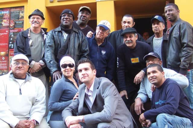 The renowned Buena Vista Social Club were early visitors. Pictured with Cubana co-owner Adrian Bagnoli (middle front)