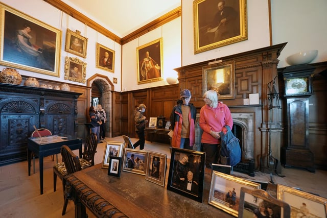 Visitors taking a tour of Bamburgh Castle.