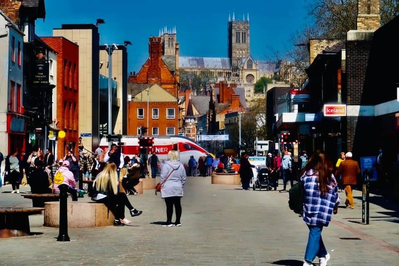 Lincoln city centre with day shoppers by Jacob.