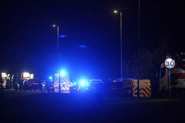 Emergency services on London Road in Salisbury, Wiltshire, near to the scene of a crash involving two trains near the Fisherton Tunnel between Andover and Salisbury