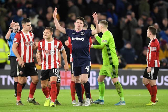 West Ham's Declan Rice shows his frustration after VAR rules out Robert Snodgrass' equaliser against Sheffield United  (Photo by Michael Regan/Getty Images)