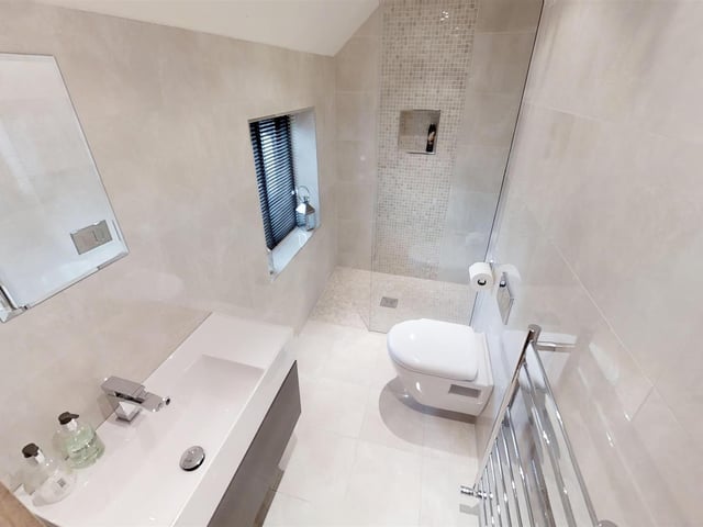 There are five bathrooms throughout the house and one W.C.