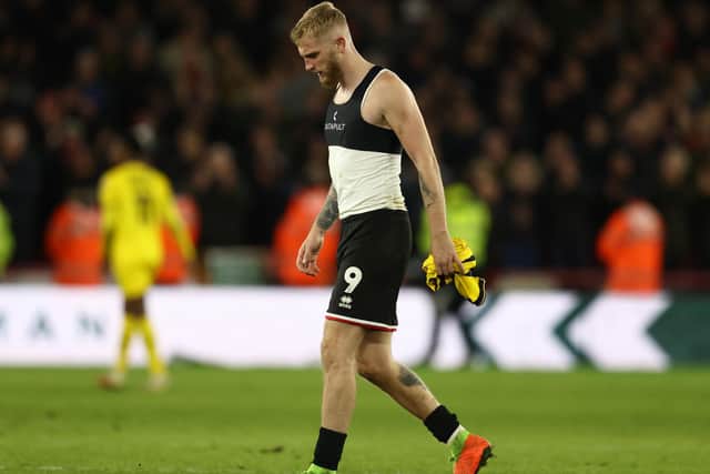 Oliver McBurnie of Sheffield United walks off dejected following the derby against Rotherham: Darren Staples / Sportimage