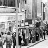 Bus stops on The Moor in May 1971 with the Woolworth's store on the left