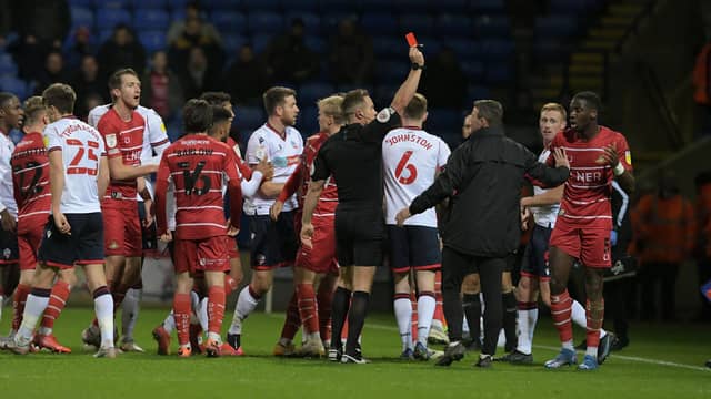 Joseph Olowu is sent off by referee Stephen Martin. Picture: Howard Roe/AHPIX