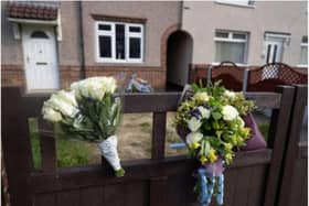 Floral tributes outside the family home in Welfare Road, Woodlands. (Photo: SWNS).
