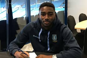 Josh Dawodu signing his first professional contract at Sheffield Wednesday in 2018. (via swfc.co.uk)