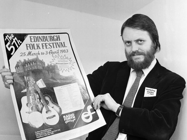 John Barrow organiser of the Edinburgh Folk Festival with a promotional poster in April 1983.