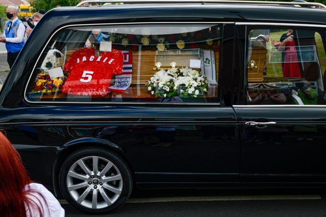 Jack's hearse included flowers shaped as an England international top with his shirt number on.