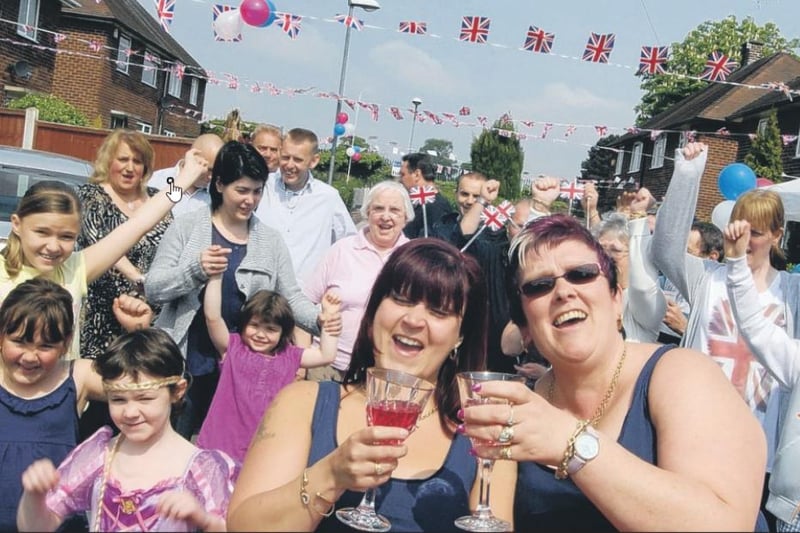Resident of Holly Close in Hucknall raised a toast to the happy couple at their street party