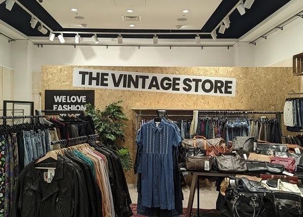 The Vintage Store is on Lower High Street. It sells branded and 'true vintage', from sweatshirts to dresses. Adidas, Nike, and more.
It is opposite Superdrug.