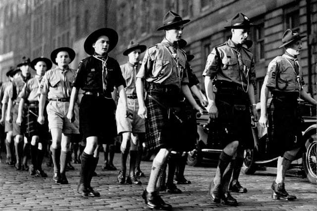August wasn't the only time people marched down the Royal Mile. The King's Scouts are pictured on parade in kilts on January 19, 1952.