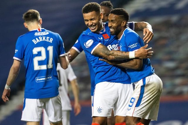 James Tavernier hugs Defoe after completing his first hat-trick for the club in an 8-0 thrashing of Hamilton Accies
