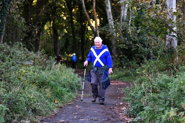 A walker on one of the many paths at Culzean.