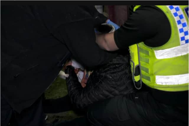Police tend to one of the victims of a machete attack in Doncaster. (Photo: Channel 4).