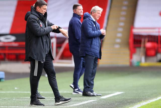 Paul Heckingbottom checks his watch during Sheffield United's defeat by Crystal Palace: Simon Bellis/ Sportimage