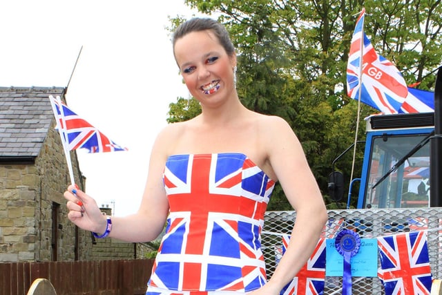Hayfield May Queen parade, Rebecca Waterhouse from Cavendish Bridal House modelling a special Union Jack dress. They also won the best dressed shop window competition.