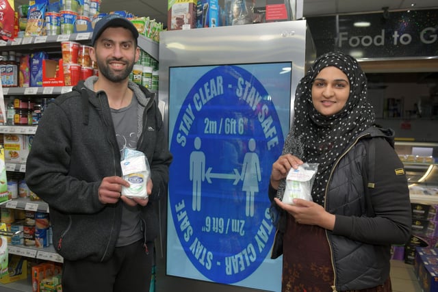 Jawad Javed and Asiyah Javed owners of the Day Today Express in Stenhousemuir supporting the community.
