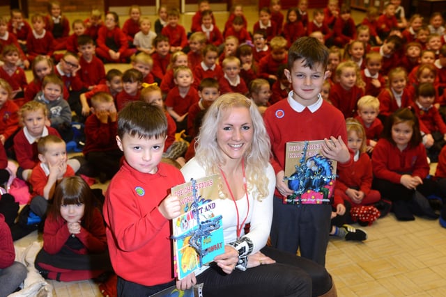 Author Laura Smith with Sam Murray, left,  and Thomas Donnison who won top places in the writing competition at Silksworth Infants School. Who remembers this from 8 years ago?