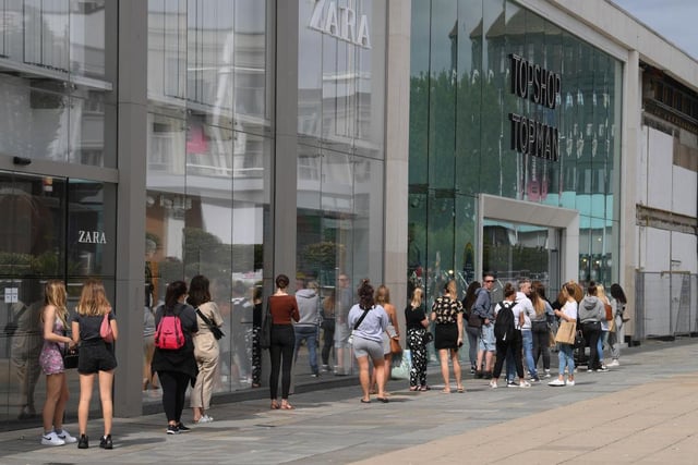 Lengthy queues formed outside Topshop in Brighton as it reopened to customers.