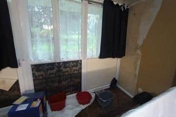Coun Rob Reiss took this picture of water pouring into the front room of Gillian\'s flat in Ecclesfield, Sheffield during Storm Babet. He has been working to get repairs done on flats in the block