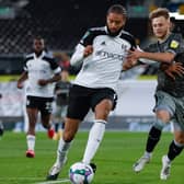 Sheffield Wednesday youngster Liam Waldock challenges former Owl Michael Hector for the ball on his first team debut against Fulham last year.