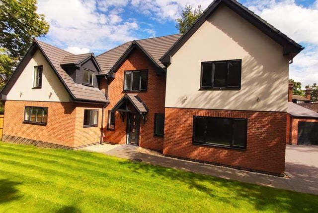This five bedroom new build has a modern open plan layout and separate study, living room and dining room. Marketed by Strike, 0113 482 9379.