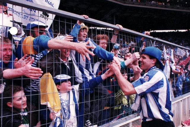 Fans celebrate as Sheffield Wednesday beat Manchester United to win the Rumbelows Cup, as the League Cup was then known,  in 1991. Wednesday went on to win promotion at the end of the season 1990/91 - a double celebration
