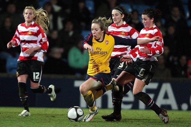 Amy Turner tackles Arsenal's Gemma Davison during the  2009 FA Women's Premier League Cup Final.