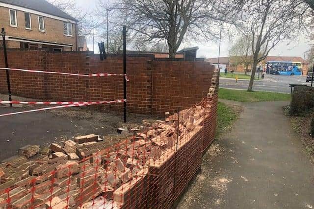 A man has been arrested after damage was caused to a number of walls on Sheffield Road, Woodhouse