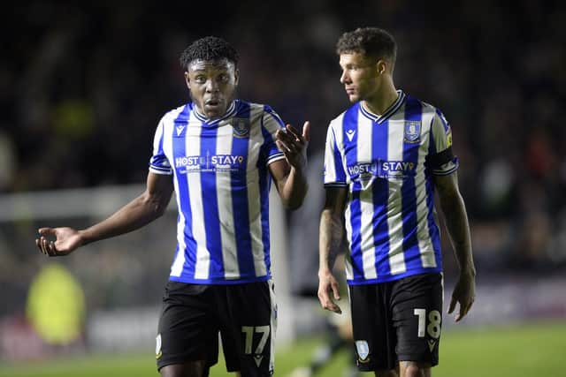 Fisayo Dele- Bashiru (left) is well into the final year of his contract at Sheffield Wednesday.
