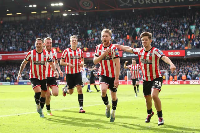 Sheffield United's on loan duo Tommy Doyle (centre) and James McAtee (right) can't face their parent club Manchester City: Jan Kruger/Getty Images