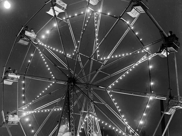 A close up of the big wheel at Aberdeen Fun Fair during the Glasgow Fair holiday in 1954.