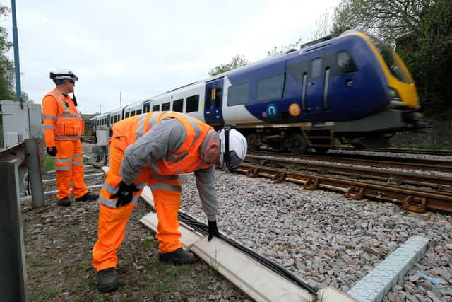 Network Rail and British Transport Police check on signalling cables alonside tracks in Sheffield. The number of cases of cable thefts across South Yorkshire, which officials say is being hit hardest nationally, has soared this month.