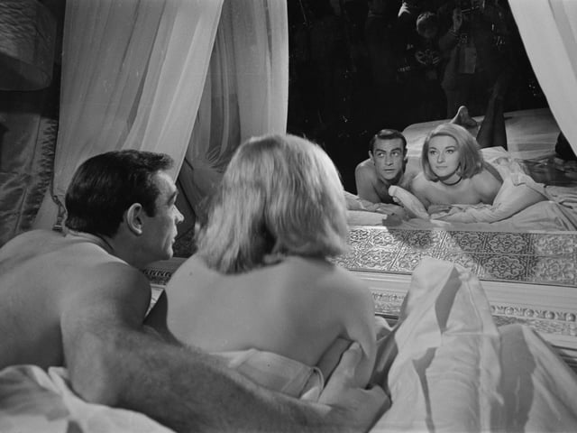 Scottish actor Sean Connery and Italian actress Daniela Bianchi rehearse and film a scene for the James Bond film 'From Russia With Love' at Pinewood Studios, UK, 9th April 1963.