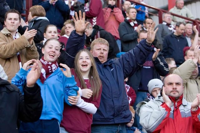 Hearts fans watched their team maintain a three point advantage over Rangers in third place after with a 4-0 win over Dunfermline.