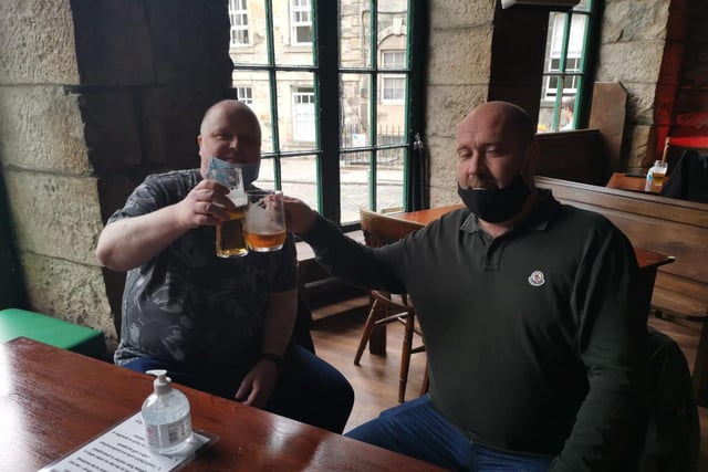 Jimmy and Graham enjoy a pint in Oz Bar