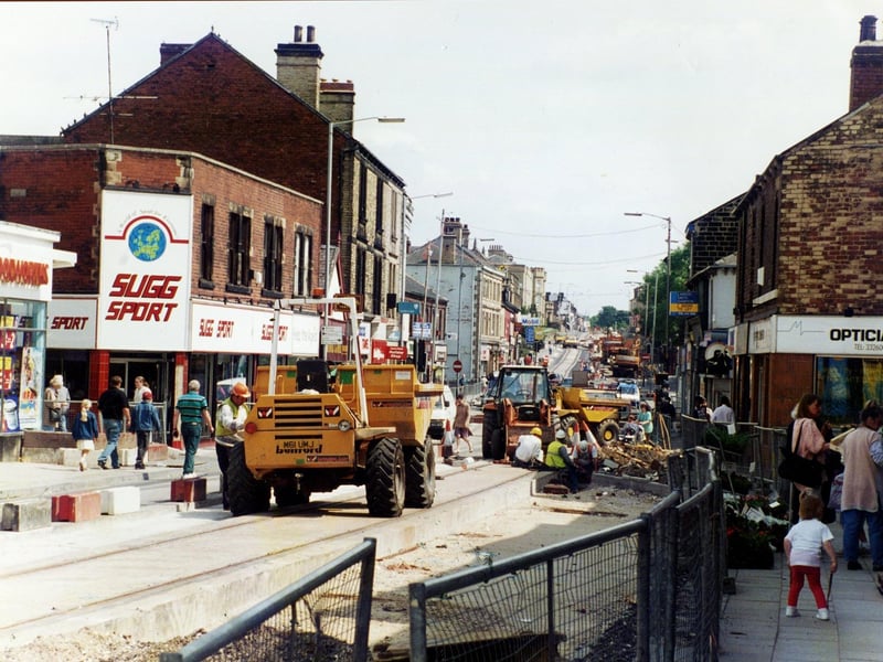 Work on the tramlines for Supertram at Hillsborough, Sheffield, in June 1995. On the left of the picture is Sugg Sport and Woolworth's