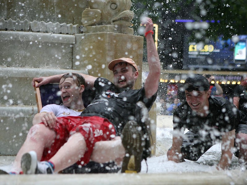 Crowds of Scotland fans were pictured in Leicester Square, London, drinking and splashing about in the square's water fountain on Thursday, 17 June.