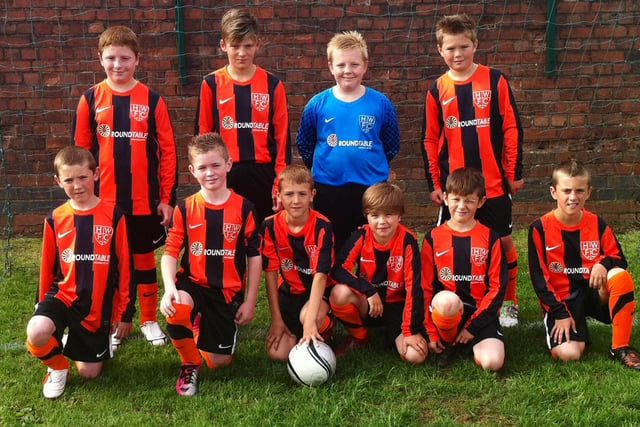 A former Hucknall Warriors U10 side proudly line up for a team pic.