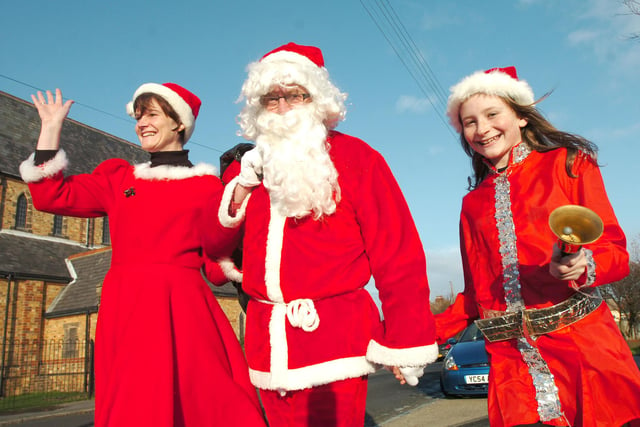 Santa and Mrs Claus arrive with their elf helper at Blackhall Community Centre in 2009.