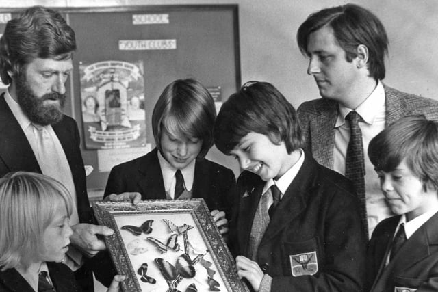 Peter Lally, Diane Weatgarth, Susan Arnett and John Usher from Hedworthfield Secondary School, Jarrow, were helping Mr Christopher Souter (left) a director of shipping firm Souter and Co. Ltd, and German management trainee with the firm, Heinrich von Rantzau, to open a batch of gifts from the firm's ship  the Stolt Sheaf. Does this bring back memories?